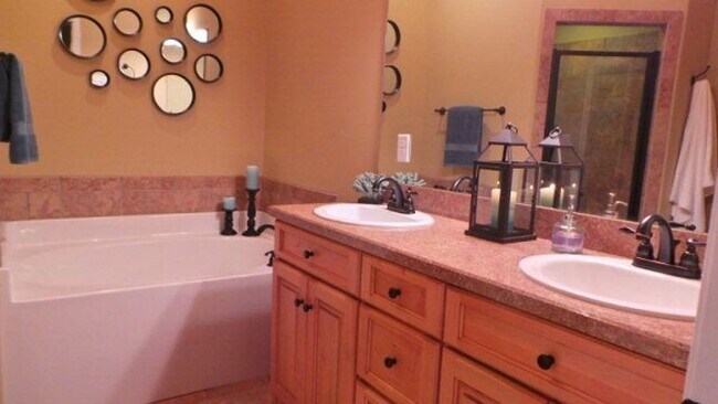 Building Photo - Modern Elegance Meets Spacious Comfort: 4B...