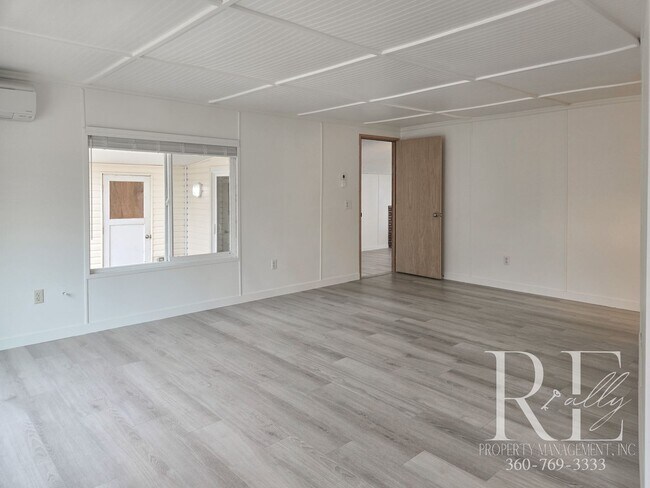 Building Photo - Private Beach Access – Bright, Breezy Livi...