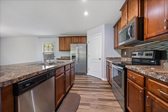 Building Photo - Spacious 4 Bedroom in Fast Growing Nassau ...