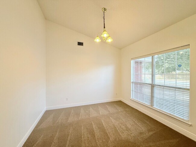 Building Photo - Spacious 4-Bedroom, All-Brick Home