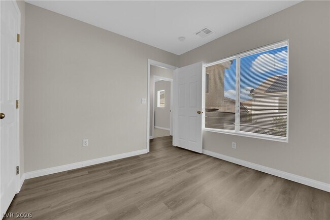 Building Photo - 8273 Golden Flowers St