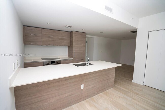 Building Photo - 1300 S Miami Ave