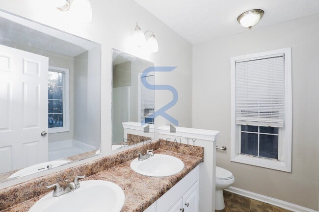 Building Photo - Move in before February 28th and choose your reward: a $250 Amazon Gift Card or a 55" Smart TV!