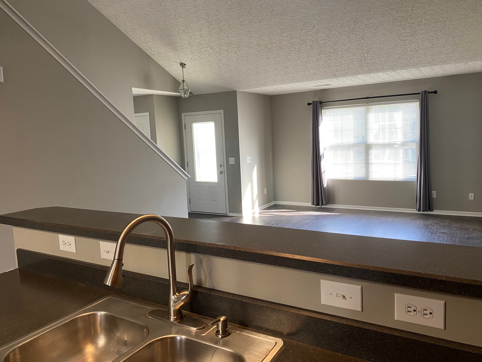 Kitchen to Living Room - 5974 Canyon Creek Dr