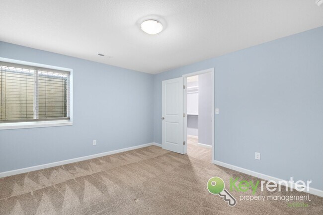 Building Photo - Newly Built 3 Bedroom Beauty: Lawn care and trash included!