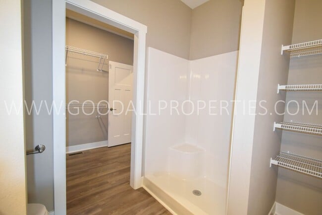 Building Photo - 4-Bedroom Ranch in Clive with Finished Basement & 3-Car Garage!