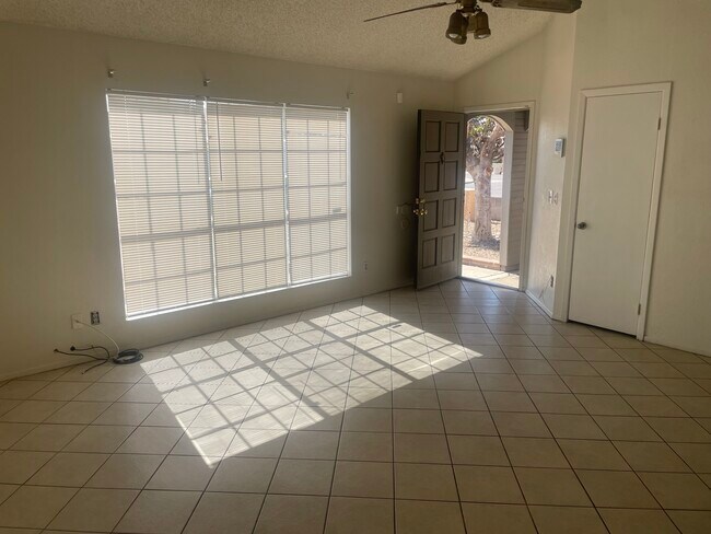 Building Photo - Four Bedroom Two Bath Vaulted Ceilings