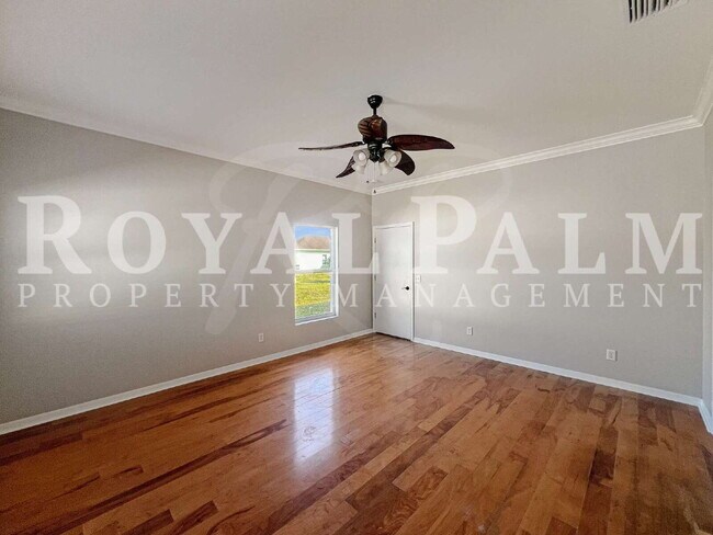 Building Photo - 3BR/2BA Home Ready to Bloom in Lehigh Acres + GARAGE!!