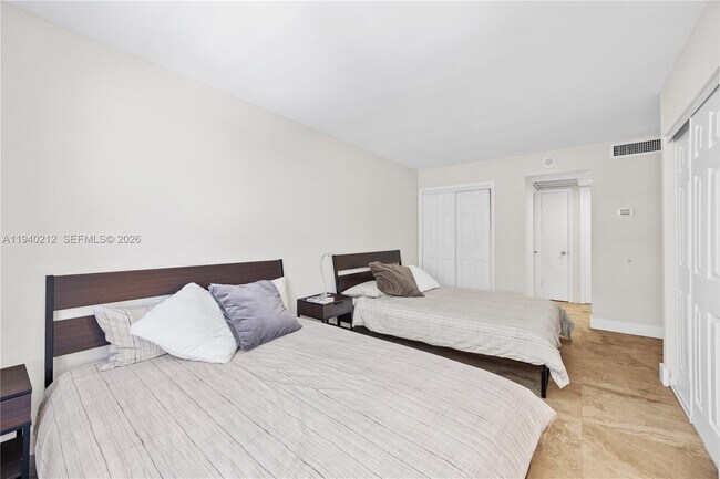 Building Photo - 5555 Collins Ave