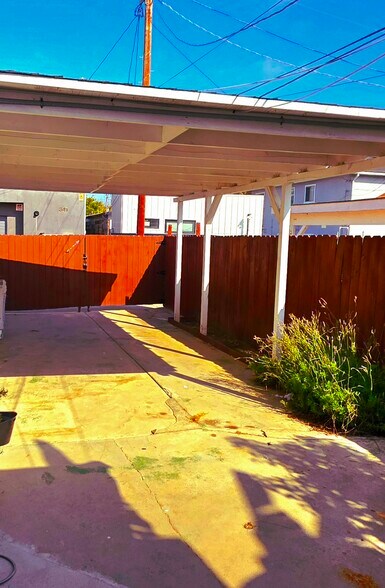 Enclosed private 2 car carport or covered patio area - 340 Rennie Ave