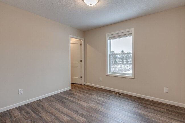 Building Photo - Newer Construction for RENT 3bd 3ba 2 car attached garage END UNIT available Jan 2026