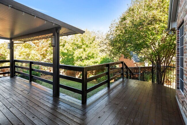 Building Photo - "Beautiful 4-Bedroom Home with Expansive Deck and Spacious Living Areas!"