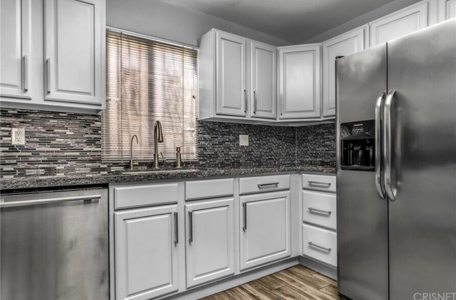 Building Photo - 6036 Hazelhurst Pl