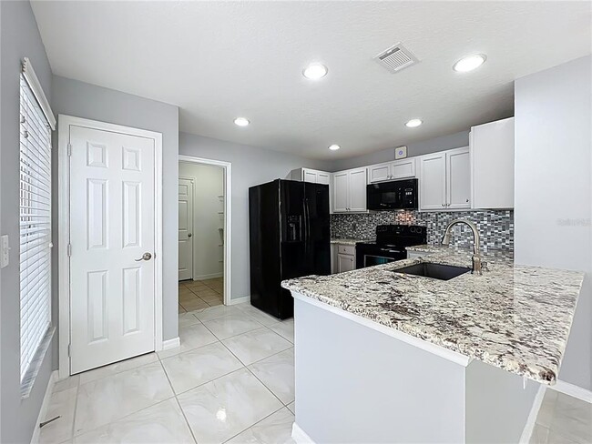 Building Photo - 12625 Tanja King Blvd