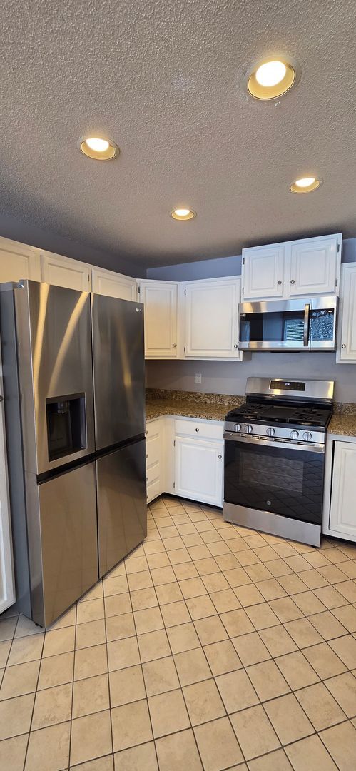 Building Photo - *** PENDING *** Beautiful 2-Bedroom Townhouse at CornerStone Condominiums