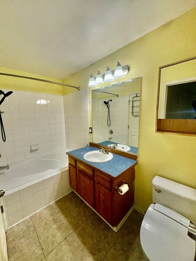 Building Photo - Check out the private fenced backyard!