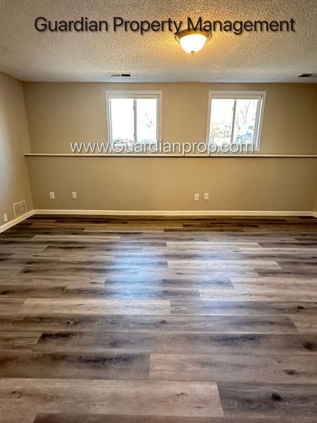 Building Photo - Champlin Single Family Home, Large Fenced Yard, Deck, 2 Car Garage,  Video Tour