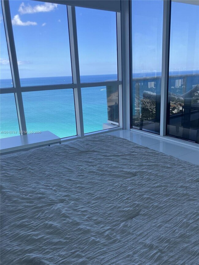 Building Photo - 18201 Collins Ave