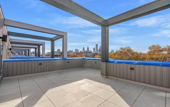Building Photo - Garage parking, private outdoor space, and skyline views—this Northern Liberties home checks ever...