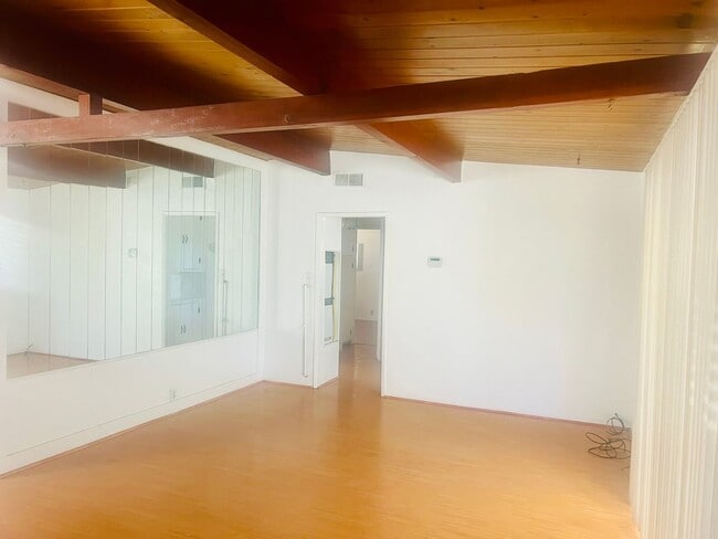 Building Photo - Charming 3-Bedroom Home with Wood Ceilings...