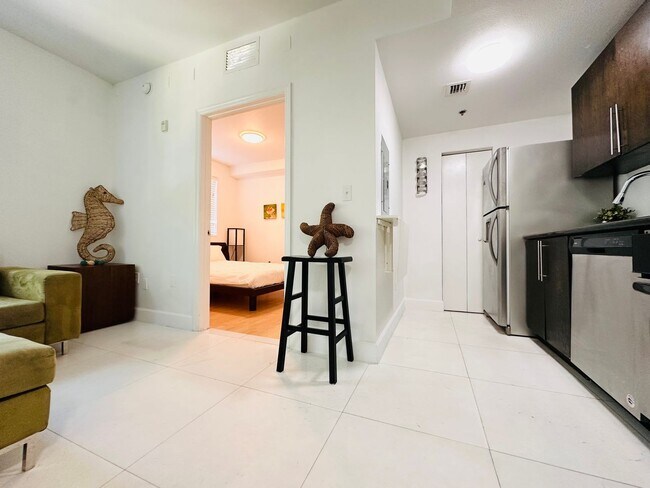 Building Photo - Bright and furnished 1/1 in classy remodel...