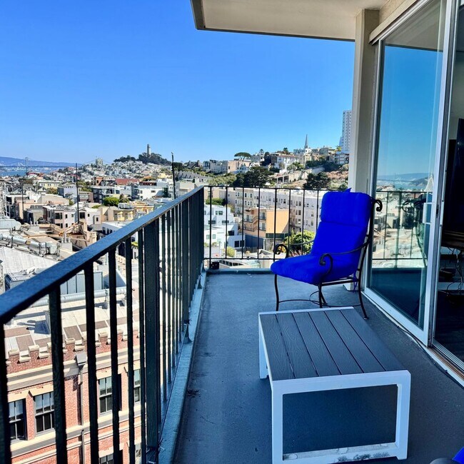 Building Photo - Just Unpack, Pour a Beverage, & Cue the Su...
