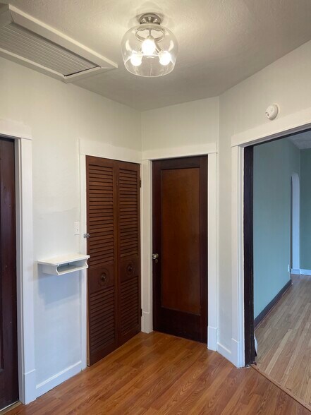 Hallway to laundry, bathroom, bedrooms and kitchen - 4417 Rosa Ave