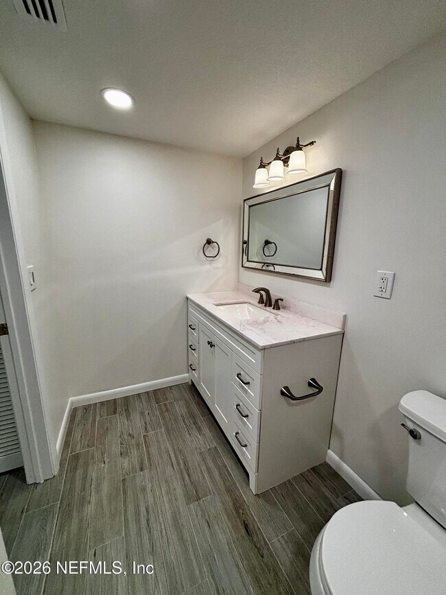 Building Photo - 9787 Sawgrass Dr E