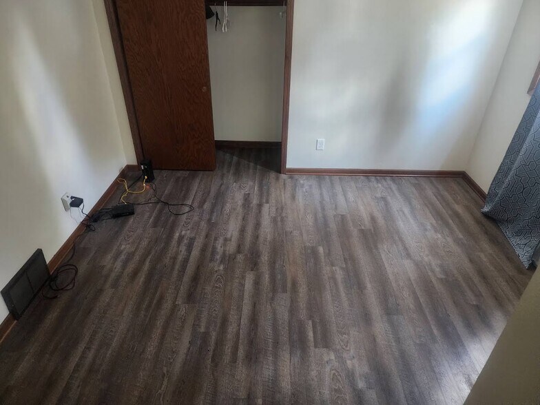 Lower Bedroom with attached half bath - 217 S Water St