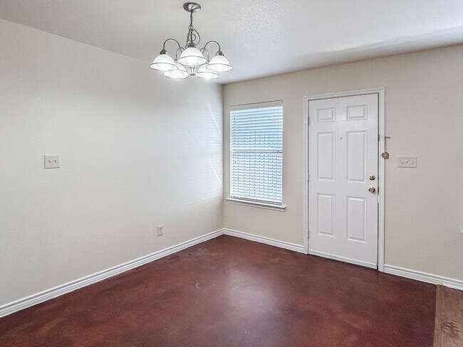 Building Photo - Charming Duplex with a Touch of Country Charm