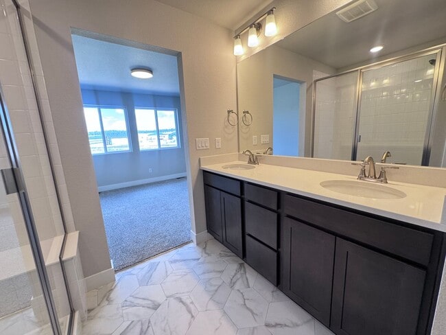 Building Photo - Sage Meadows II Townhomes — Lakeside Living Meets Modern Comfort!