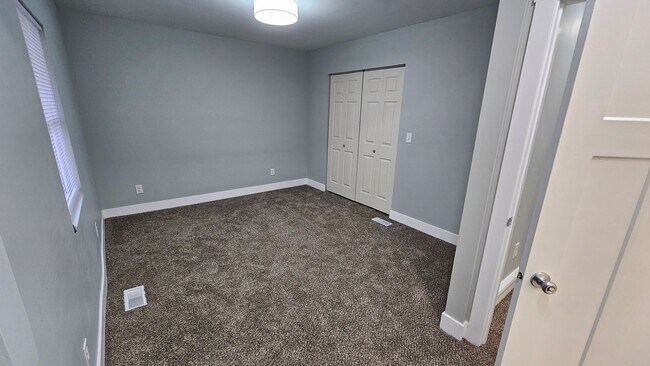 Building Photo - Stunning Renovation Ready for Your Finishing Touches!