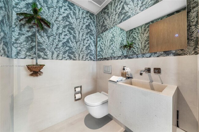 Building Photo - 10203 Collins Ave