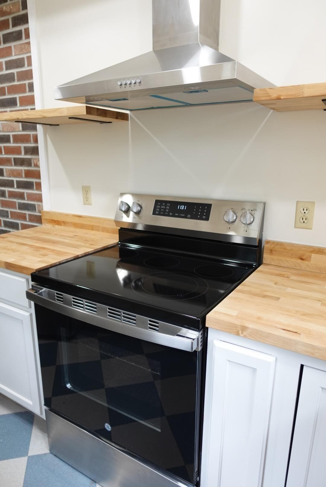 New electric Range and stainless details - 327 Hudson Ave