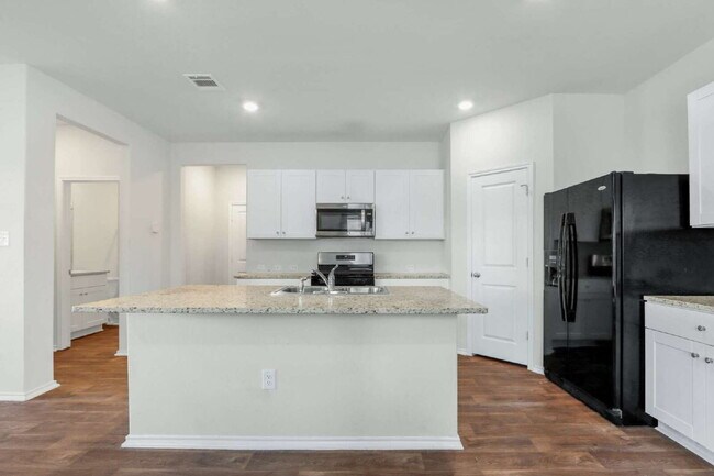 Building Photo - "Spacious 5-Bedroom San Antonio Gem with G...