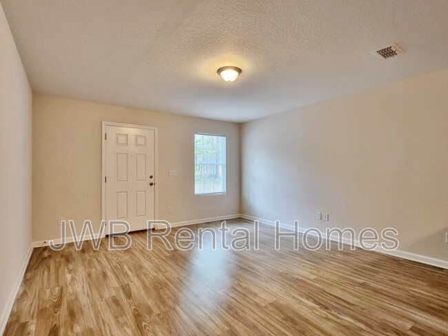 Building Photo - 8483 McGirts Village Ln