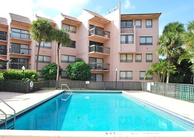 Building Photo - Now Leasing: 1-bedroom and 1.5 bath condo ...