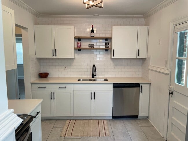 Building Photo - Updated Cute Cape - 3 bedroom, 2 bath -  4509 Fitzhugh Ave.