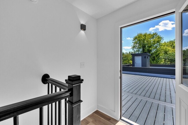 Building Photo - Modern New Construction Townhome with Roof...