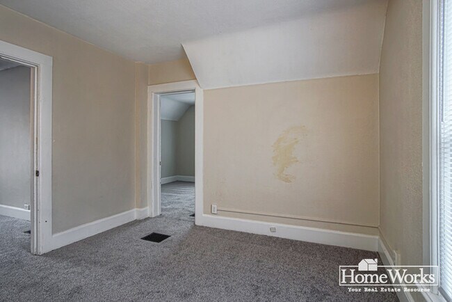 Building Photo - Charming 3 - Bedroom Home with Wrap-Around Porch on Corner Lot