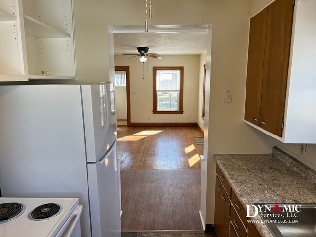 Building Photo - Updated 4+ Bedroom, 2 Bathroom House with Garage and Fenced Backyard