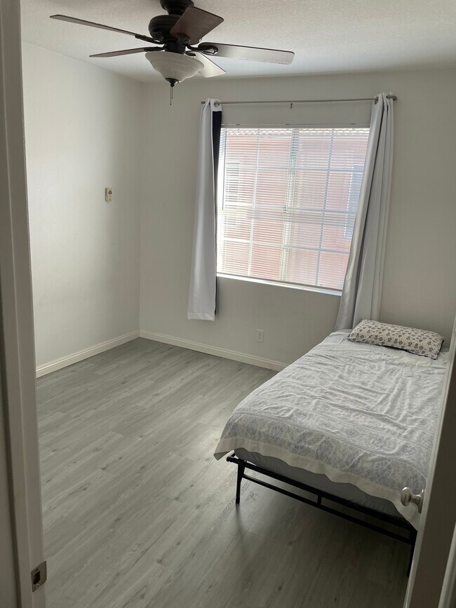 2nd bedroom (twin bed in photo) - 21832 S Vermont Ave