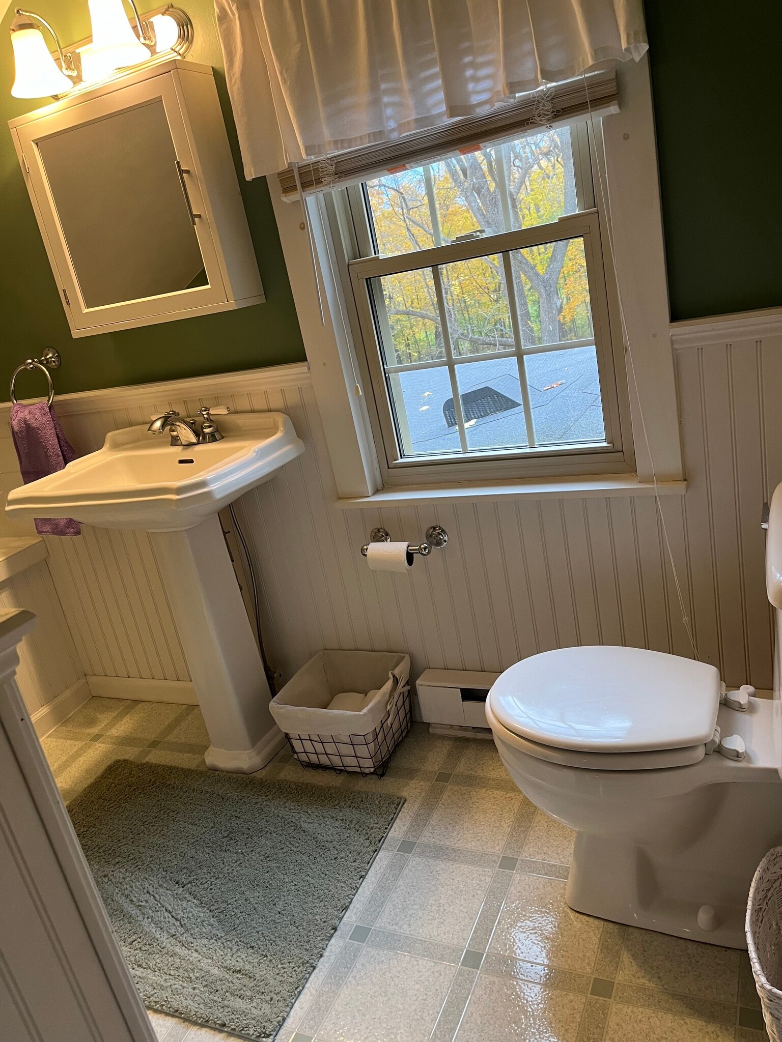 The upstairs bathroom has a tub and a shower. - 11 Kellogg St