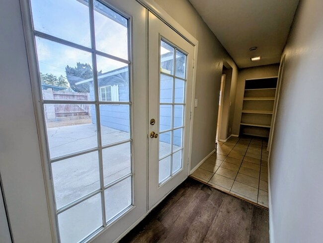 Building Photo - 4-bedroom house with a 2-car garage availa...