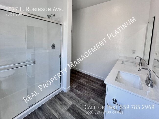 Building Photo - 6077 E Robinson Ave