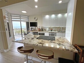 Building Photo - 20191 E Country Club Dr