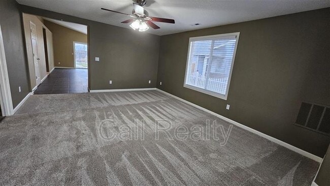 Building Photo - 9302 W Caelen Ave