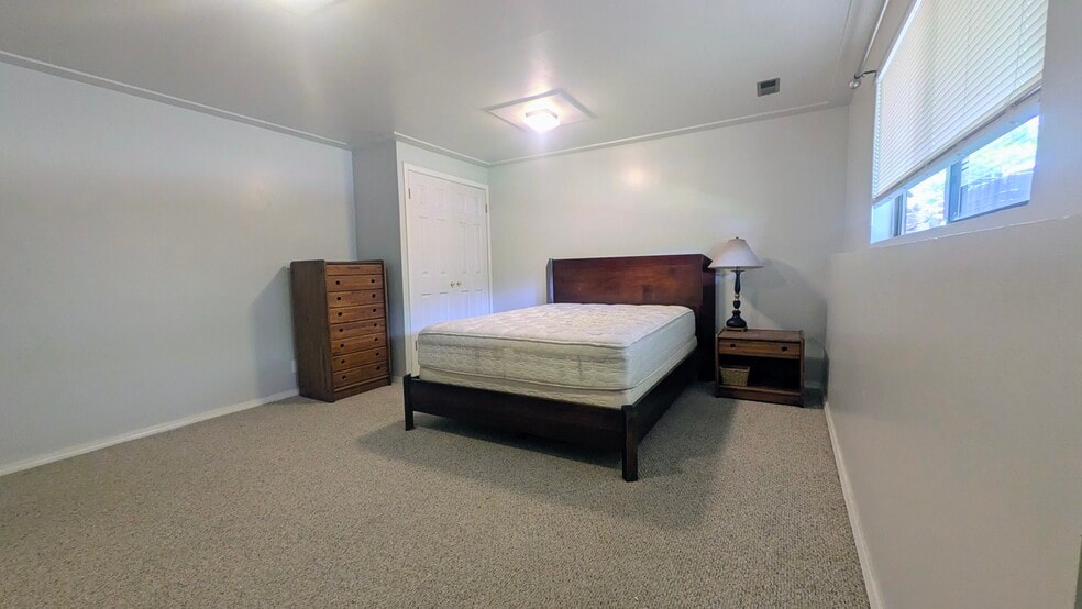 Bedroom includes ample closet and drawer space. - 1135 E Santa Maria Dr