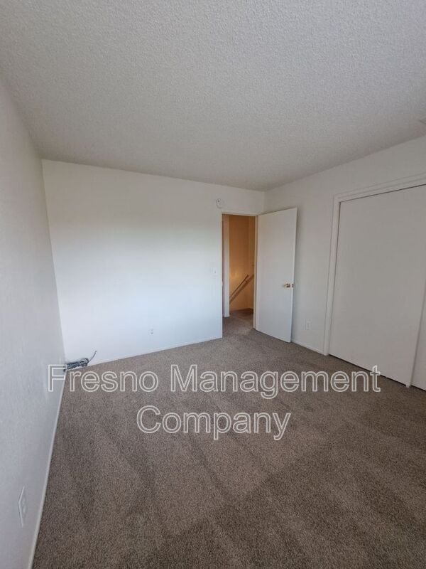 Building Photo - 4765 N Cedar Ave