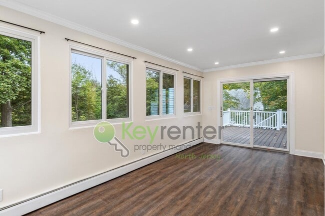 Building Photo - Spacious 4-Bedroom Home with Huge Fenced Y...